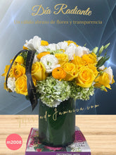 Arreglo floral con tulipanes y ranunculus