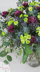 Arreglo con Claveles y Yokos