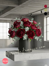 Arreglo encanto peonías vino con dólar