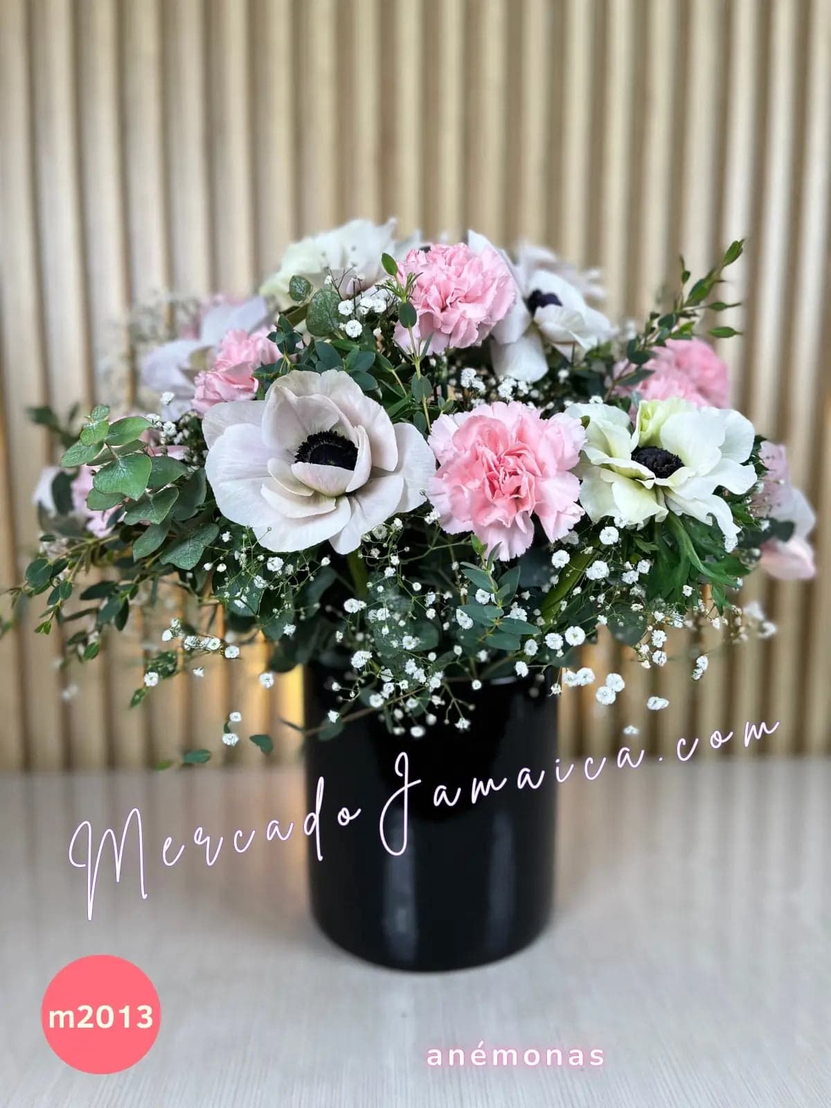 Anémonas rosa y claveles en florero CDMX