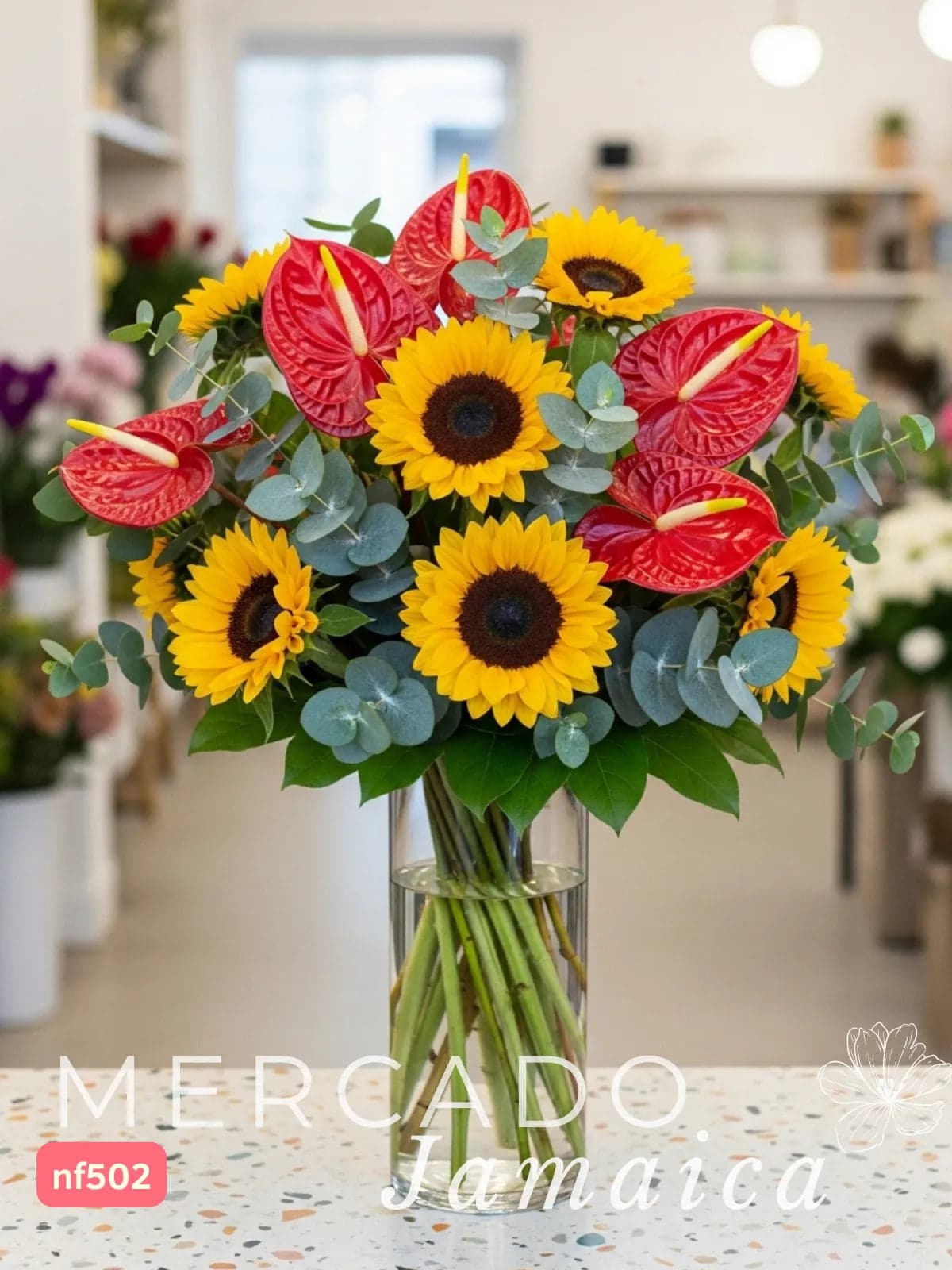 Arreglo 10 Girasoles y Anturios Rojos en Florero CDMX